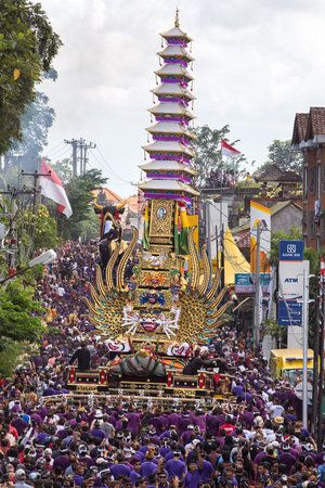 Bali, Indonesia - August 20, 2016: Balinese people participating in royal cremation ceremony in Ubud, Bali.のeditorial素材