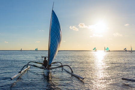 Traditional balinese boats in the sea, Bali, Indonesiaのeditorial素材