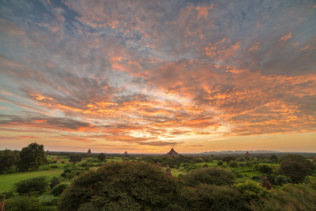 Beautiful sunrise over the ancient pagodas in Bagan, Myanmarの写真素材