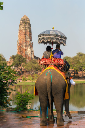 Ayutthaya, Thailand - March 3, 2017: Tourists on the elephants ride tour of the ancient city in Ayutthaya, Thailandのeditorial素材