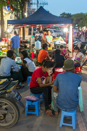 Monywa, Myanmar - October 9, 2016: Burmese people eating street foods in Monywa, Myanmar.のeditorial素材