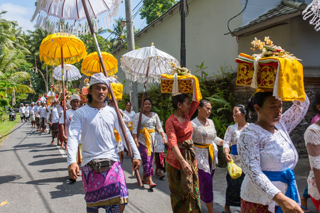 Bali, Indonesia - September 16, 2016: Traditional balinese procession during Galungan celebration in Ubud, Indonesiaのeditorial素材