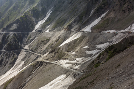 Traffic on the Zojila Pass between Srinagar and Kargil in Jammu and Kashmir, Indiaの写真素材