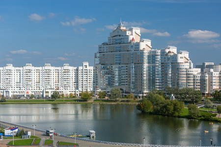 Minsk, Belarus - September 27, 2017: View of white building in Minsk downtown, Nemiga district view with Svisloch river, Belarus.のeditorial素材
