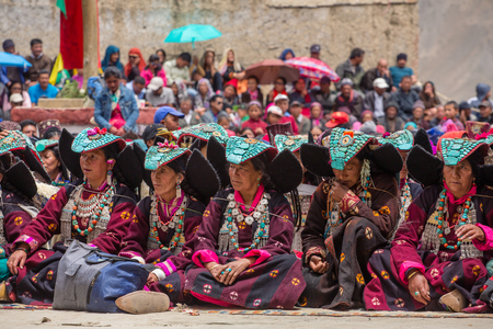 Lamayuru, India - June 19, 2017: Unidentified Zanskari women wearing ethnic traditional Ladakhi headdress with turquoise stones called Perakh Perak, Ladakh, Indiaのeditorial素材