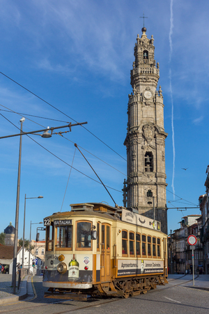 Porto, Portugal - January 16, 2018: Old tram and famous Torre dos Clerigos tower in Porto, Portugal.のeditorial素材
