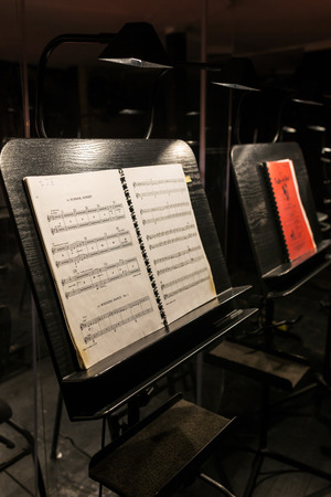 Music note stands in orchestra pit in music theaterのeditorial素材