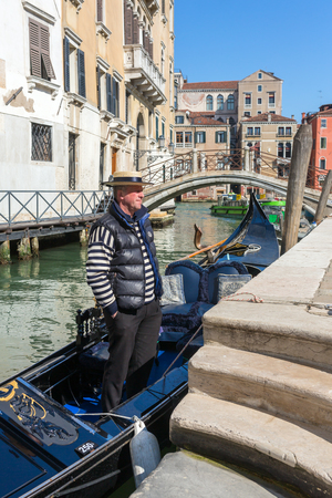 Venice, Italy - March 23, 2018: Gondola parking on the side canal in Venice, Italyのeditorial素材