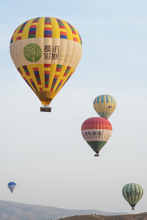 Cappadocia, Turkey - October 19, 2018: Hot Air Balloons flying during sunrise in Cappadocia, Turkeyのeditorial素材