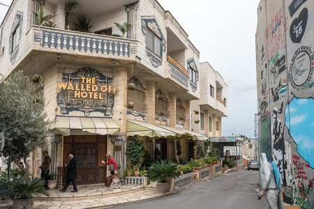 Bethlehem, Palestine - November 22, 2018: Walled Off Hotel set up and decorated by famous artist Banksy near the separation wall in West Bank, Palestineのeditorial素材