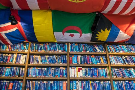 Tourist guide books on a shelf in hostel in Antalya, Turkeyのeditorial素材