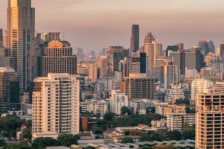 Bangkok, Thailand - March 6, 2019: Bangkok City skyline with urban skyscrapers at sunset, Thailand