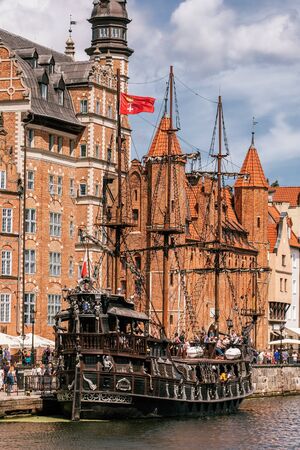 Cityscape of Gdansk with ship Black Pearl on the river Motlawa. Old Town of Gdansk, Poland.のeditorial素材