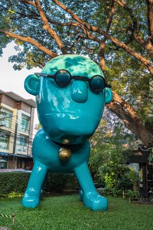Modern art sculpture of a man dog located in Iberry Garden, Chiang Mai, Thailandのeditorial素材