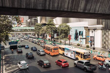 Traffic on busy street junction in Bangkok, Thailand.のeditorial素材