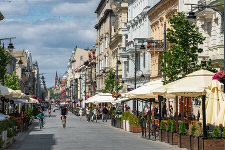 Piotrkowska Street in Lodz. Popular walking street with cafes in Lodz, Polandのeditorial素材