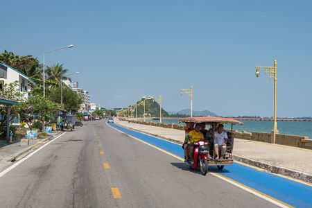 Promenade by the sea with monkey hill at background in Prachuap Khiri Khan, Thailand.のeditorial素材