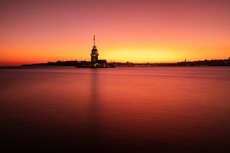 Silhouette of the Maiden Tower at sunset in Istanbul, Turkey. Long exposure shotの写真素材