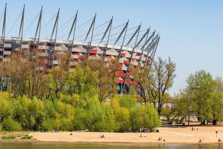 View of the National Stadium and public beach at Vistula river at spring in Warsawのeditorial素材