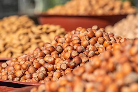 Hazelnuts and other nuts on the marketの写真素材