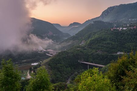 Beautiful mountain landscape with a road near Sarajevo in Bosnia and Hercegovinaの写真素材