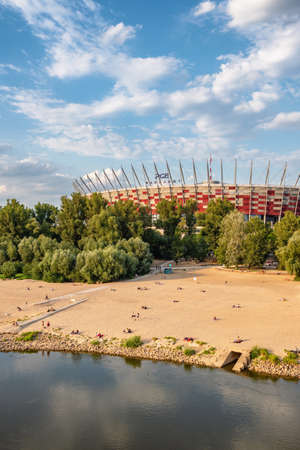 View of the National Stadium and public beach at Vistula river at spring in Warsawのeditorial素材