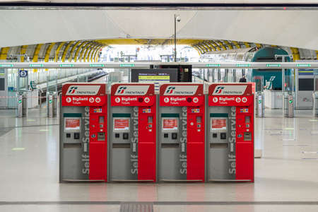 Ticket machines for trenitalia trains at train station in departure terminal 3 in Rome Fiumicino Airport, Rome, Italyのeditorial素材