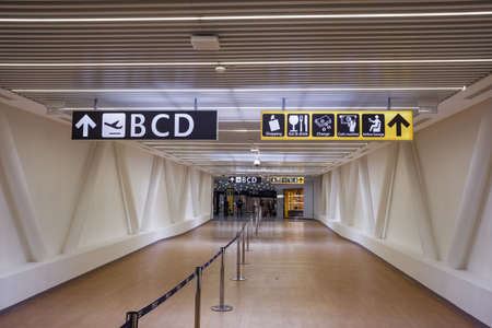 Airport direction signs in Rome Fiumicino Airport.のeditorial素材