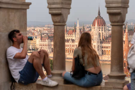 Unidentified people enjoying the view at Hungarian parliament building from Fishermans Bastion in Budapest, Hungary.のeditorial素材