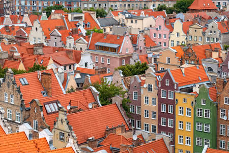 Top view of Gdansk old town with reddish tiled roofs of old town in Gdanskの写真素材