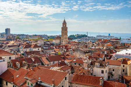Bell tower and historic buildings in old town of Splitの写真素材