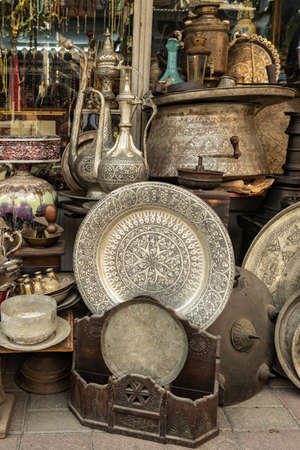 Old metal kitchenware displayed in the antique shopの写真素材