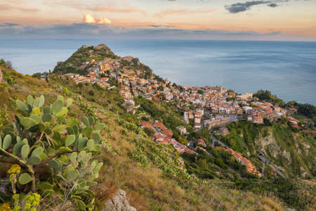 Picturesque Taormina town at sunset in Sicily, Italyの写真素材