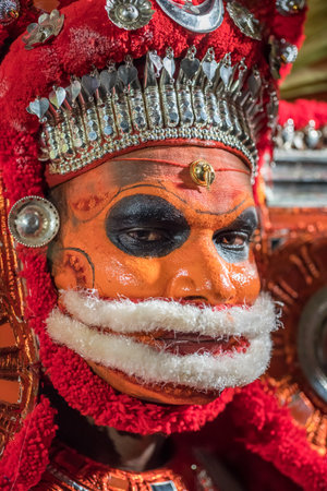 Portrait of an unidentified Theyyam dancer during temple festival in Payyanur, Kerala, Indiaのeditorial素材