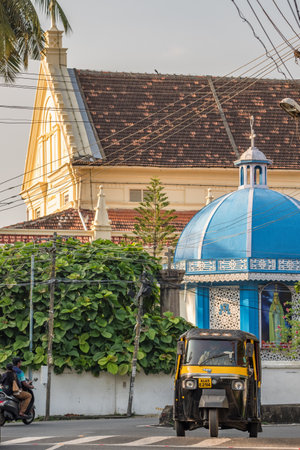 Auto rickshaw and portuguese church at background in Fort Kochi, Kerala, Indiaのeditorial素材