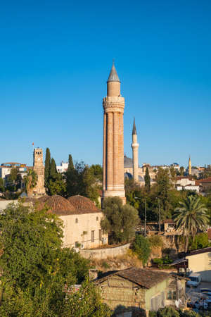 Clock tower and Yivli minaret in Kaleici old town of Antalya, Turkeyの写真素材