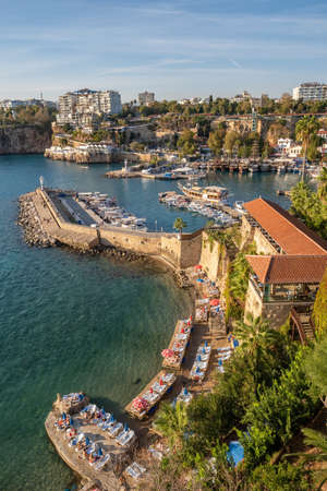 Unidentified people sunbathing on the small beach in Kaleici old town of Antalya.のeditorial素材