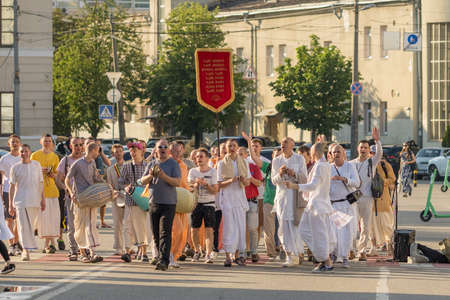 Hare Krishna devotees walking along the street, singing and dancing in Kiev, Ukraine.のeditorial素材
