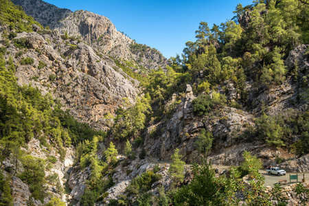 Car with tourists driving in Goynuk canyon, Turkeyの写真素材