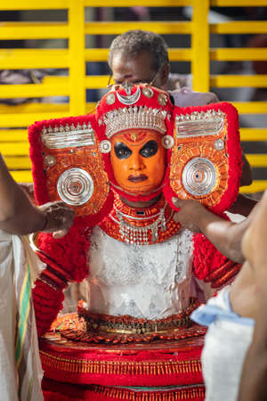 Theyyam artist prepearing for Theyyam temple celebration in Payyanur, Kerala, Indiaのeditorial素材