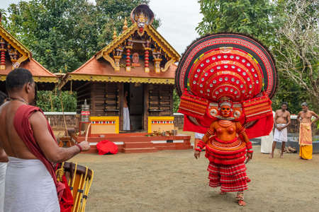 Theyyam perform during temple festival in Kannur, Kerala, India.のeditorial素材