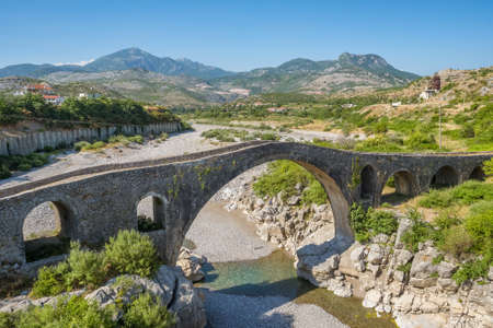The Old Ottoman Mesi Bridge on the Kir river, Shkoder, Albaniaの写真素材