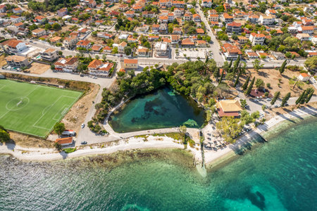 Aerial drone view of Karavomilos lake in Sami town, Kefalonia island, Greeceの写真素材