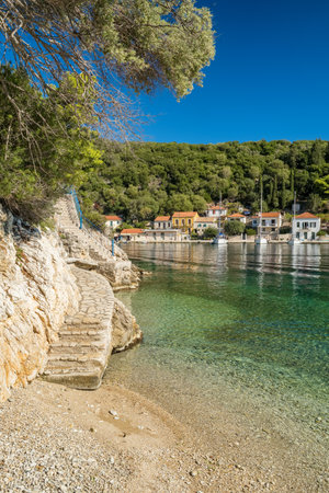 Small beach in picturesque Kioni fishing village on the Ithaca island, Greeceの写真素材