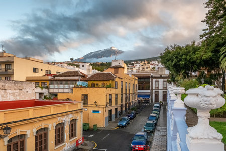 View of El Teide volcano from Icod de los Vinos town on Tenerife during sunset, Canary Islands, Spain.の写真素材