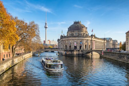 Tourist boat passing by Museum Island on Spree river in Berlinのeditorial素材