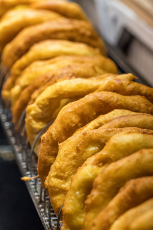 Traditional Hungarian street food Langos at fair