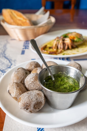 Papas arrugadas, wrinkled potatoes, in the traditional Canarian restaurant on Tenerife island, Spain.の写真素材