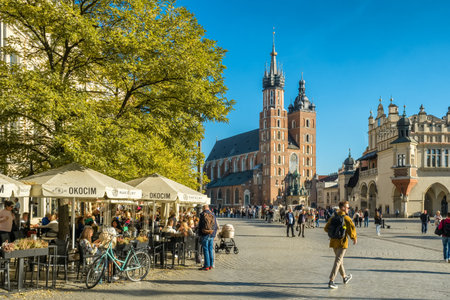 Krakow cloth hall and Saint Marys Basilica on the main market square in Cracow, Poland.のeditorial素材