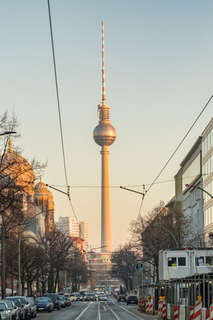Street view at the iconic Berlin TV Tower at sunset in winter.のeditorial素材